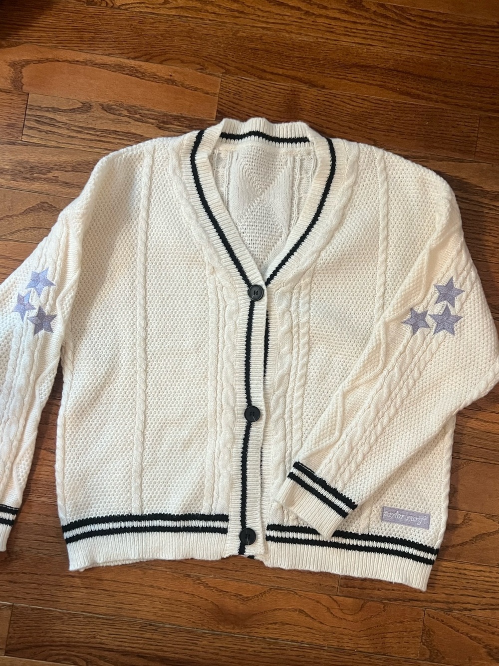 Women's Taylor Swift Cream Knit Cardigan with Navy Trim and Star Detail